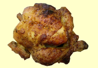 imatge d'un pollastre a l'ast